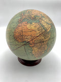 Globe on wooden base